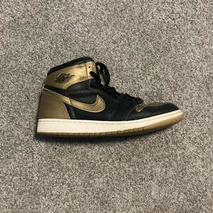 Black and Gold Nike Jordans